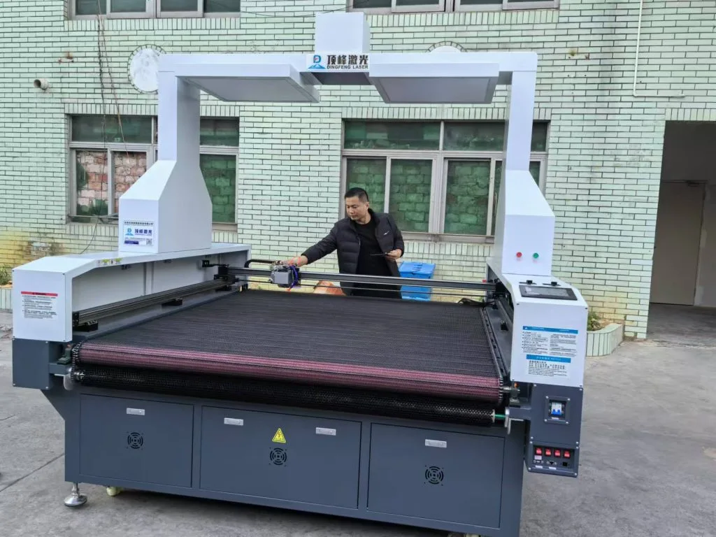CO2 fabric laser cutter cutting garment patterns with clean sealed edges
