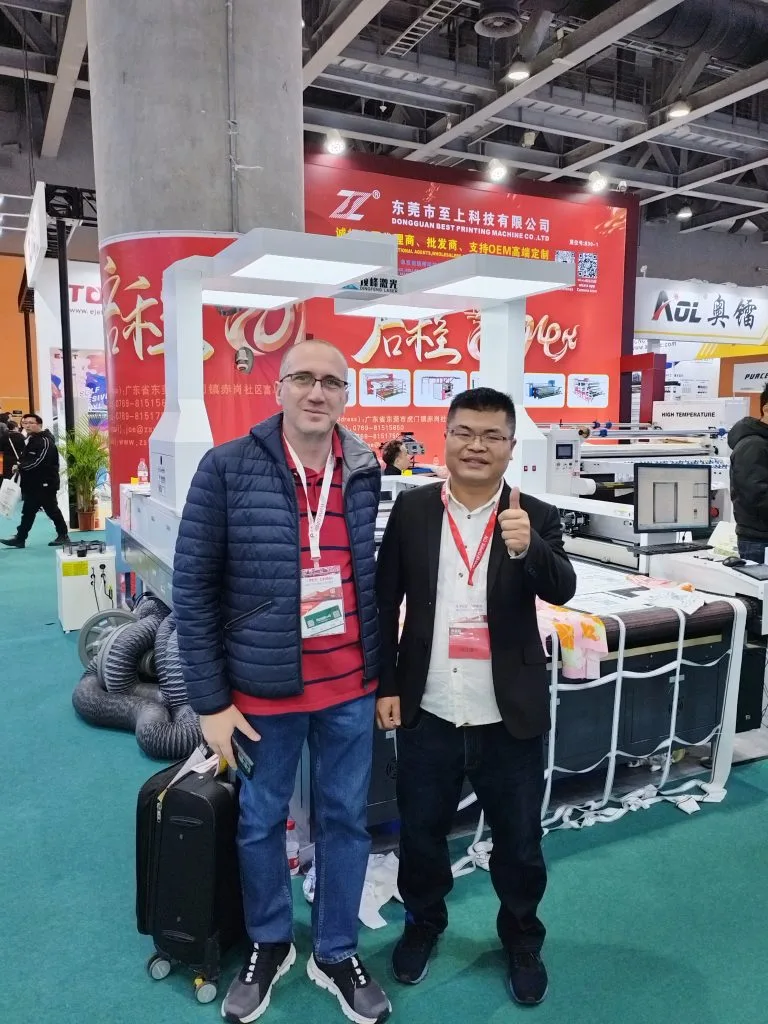 Fabric laser cutting machine on-site order from advertising manufacturer at DPES Guangzhou 2024
