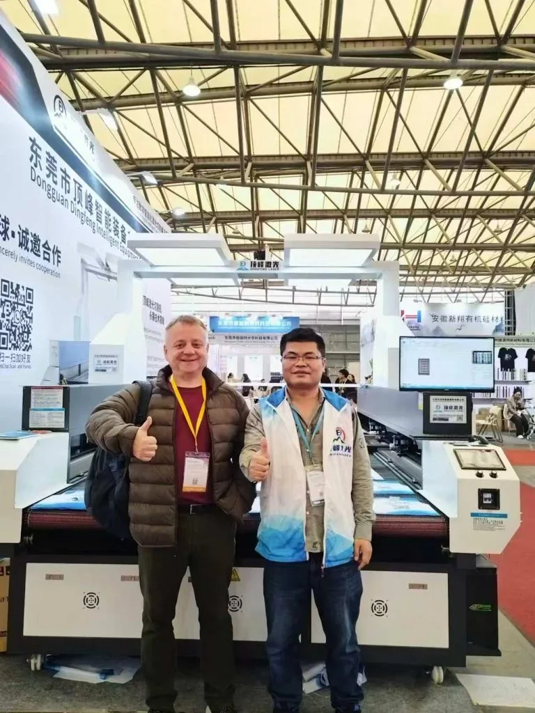 Automated fabric laser cutting machine for signage company - client case at DPES Guangzhou 2024
